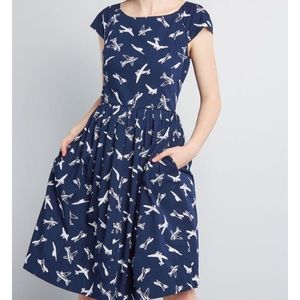 Retro blue airplane dress by Emily and Fin